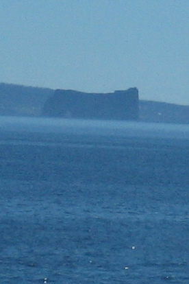 Percé Rock from a distant train.